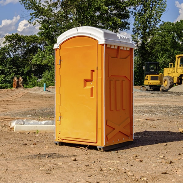 how often are the portable restrooms cleaned and serviced during a rental period in Grenada County